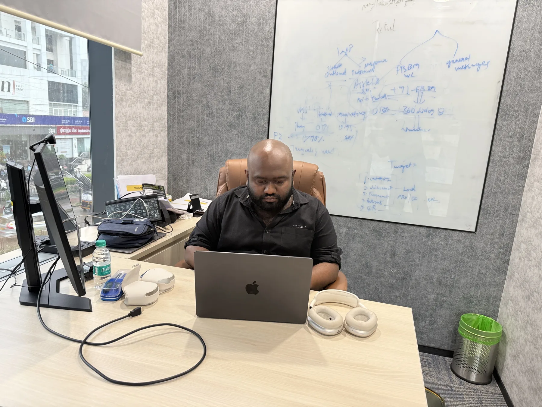 Working at a laptop in the office